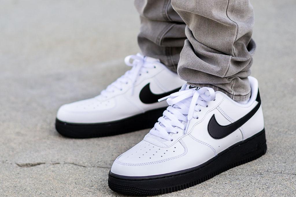 black air force ones with white bottom